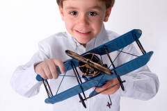 Boy with blue plane