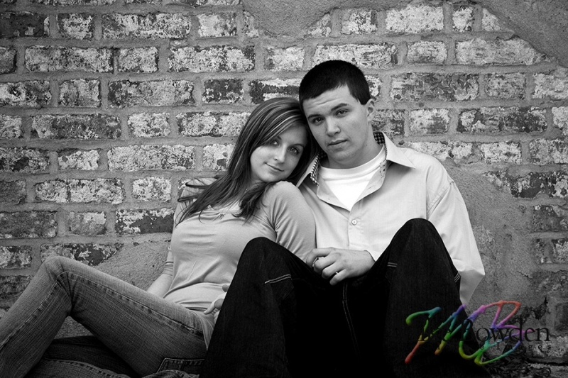 Young_couple_next_to_wall_BW